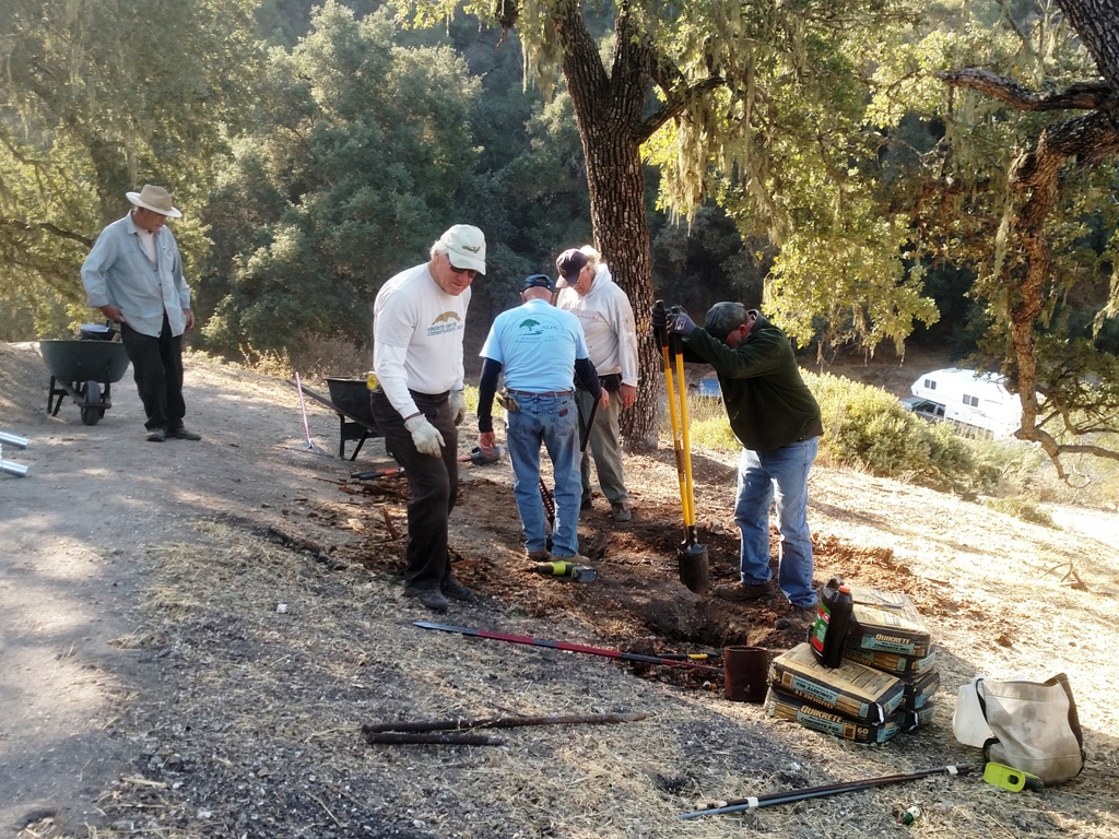 ALPS Trail Crew digging post holes for the new bench